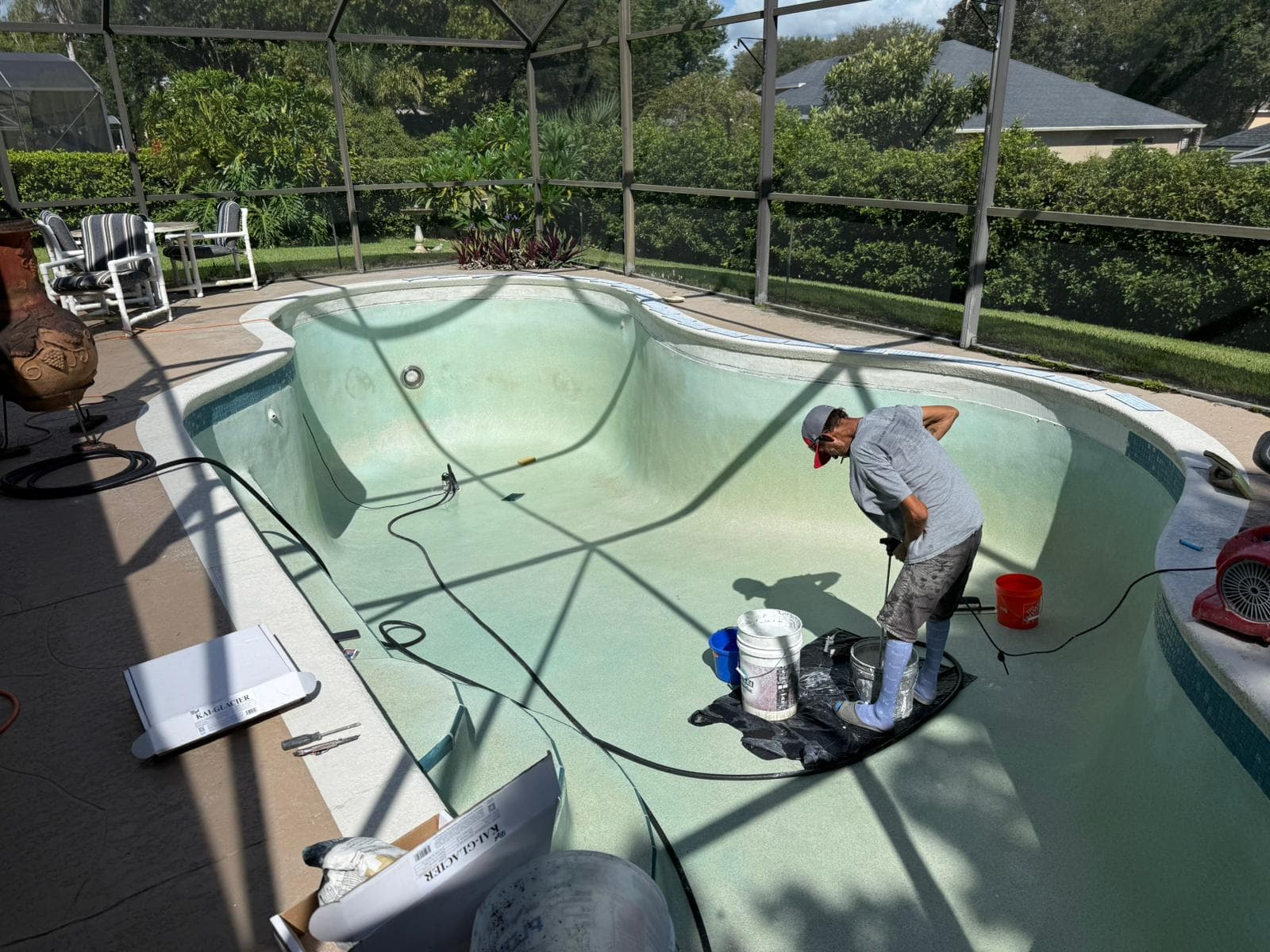 Professional tile installation in progress - expert technician installing waterline tiles