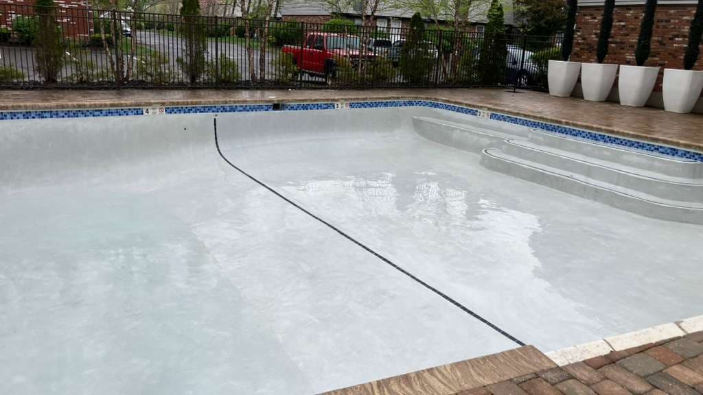 Pool after resurfacing - showing the complete transformation with pristine finish
