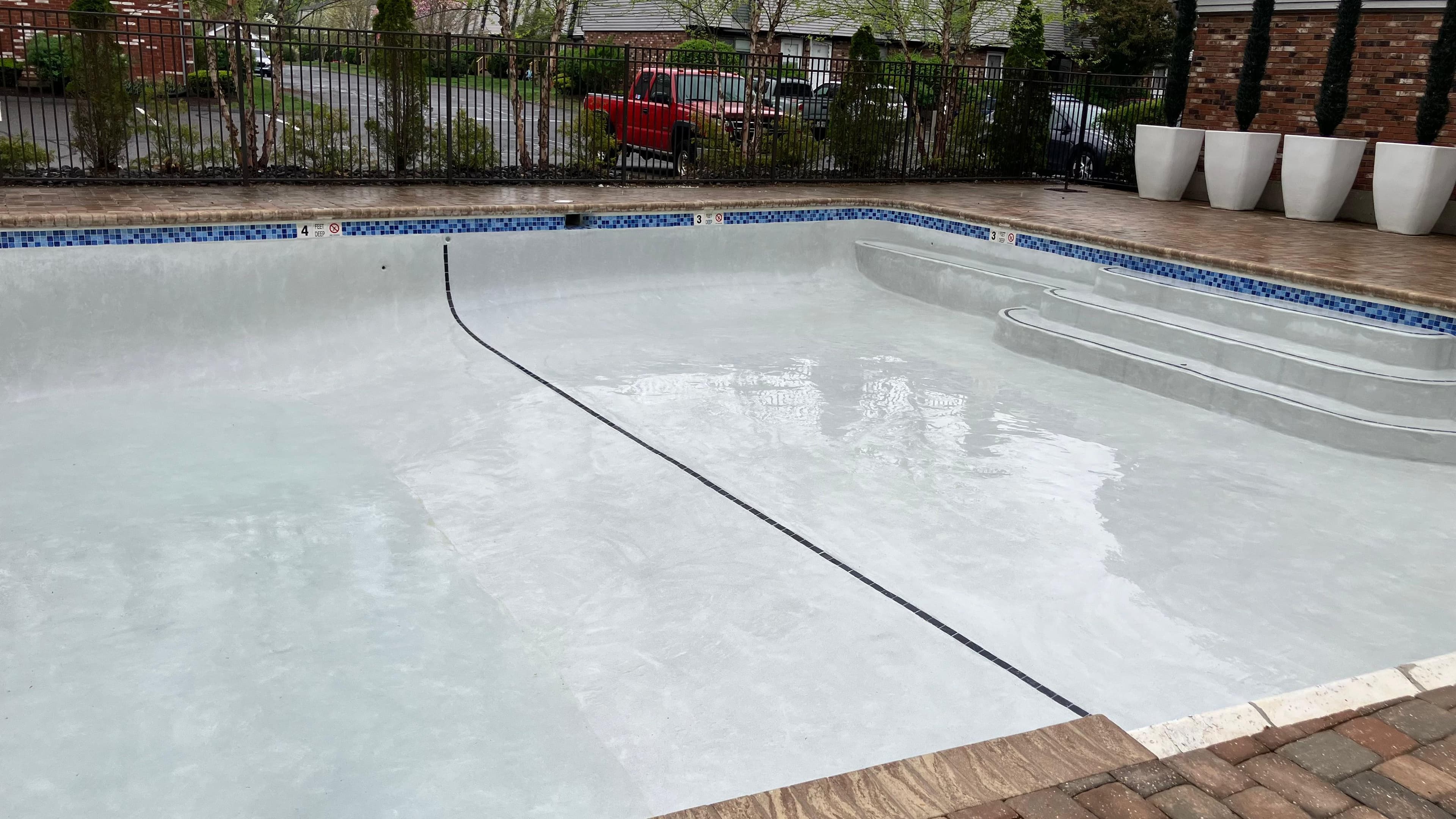 Pool after resurfacing - final result showing professional quality finish