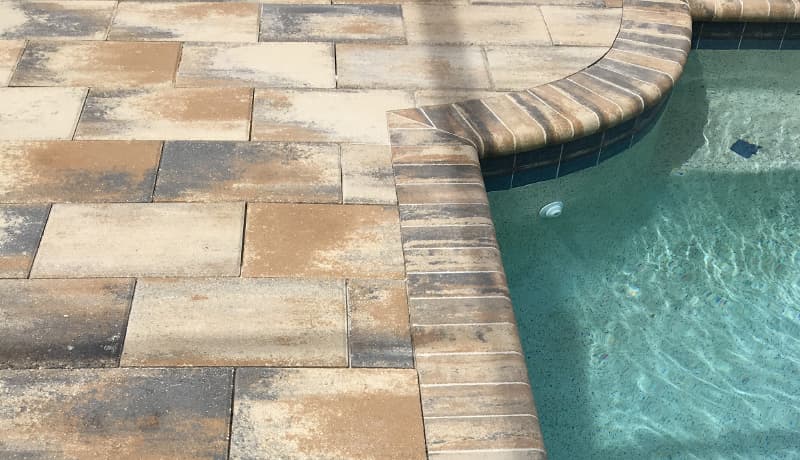 Flagstone pool coping installed on pool edge