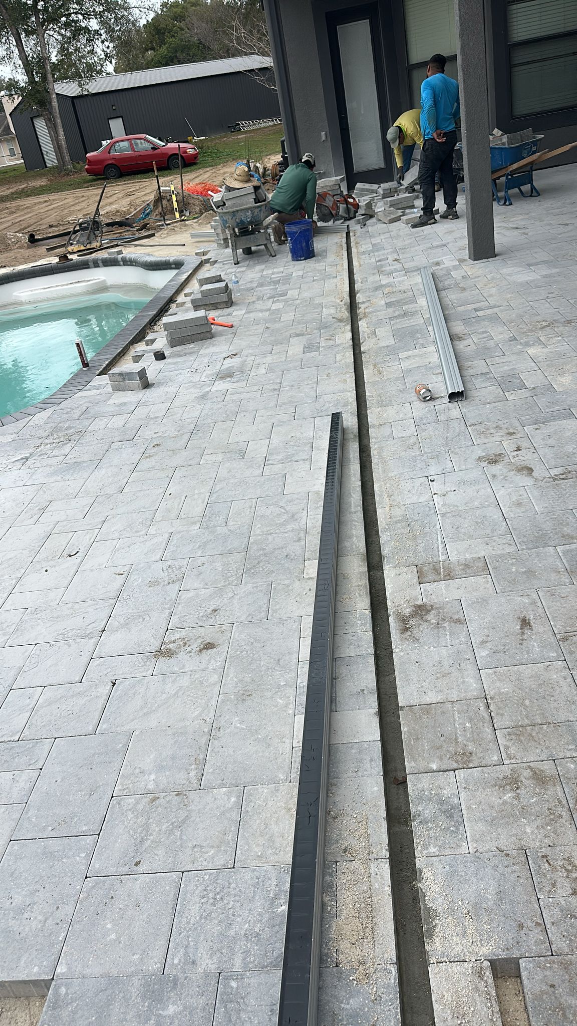 Decking Installation - Professional fiberglass pool installation Day 8-10 process in Florida by certified Latham pool installers using crane equipment